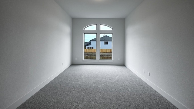 unfurnished room with carpet