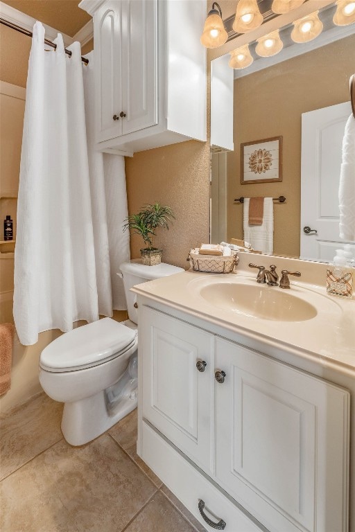 bathroom with vanity, toilet, walk in shower, and tile patterned flooring