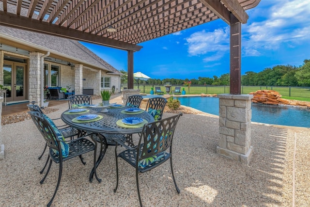 view of patio / terrace featuring a fenced in pool and a pergola