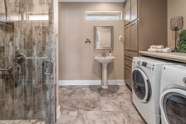 laundry room with sink and independent washer and dryer