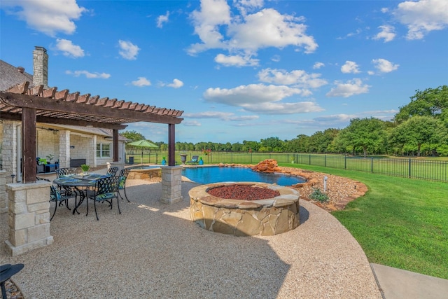 view of pool featuring a pergola, a patio, a lawn, and a fire pit