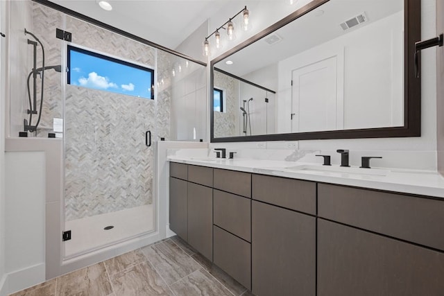 bathroom with vanity and walk in shower