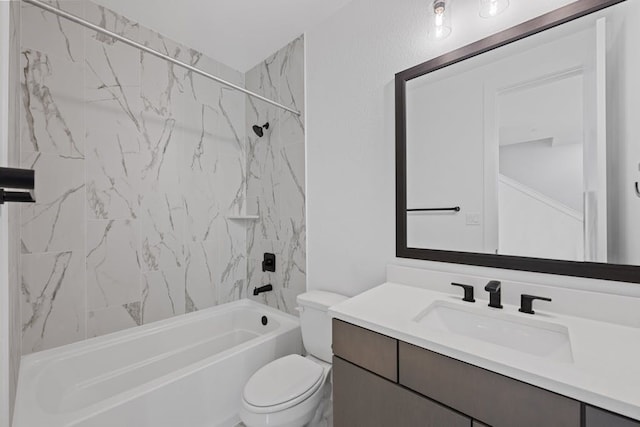 full bathroom featuring vanity, tiled shower / bath combo, and toilet