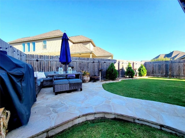 242 Freeman Loop, Liberty Hill, TX 78642 - fenced backyard with a patio and an outdoor living space