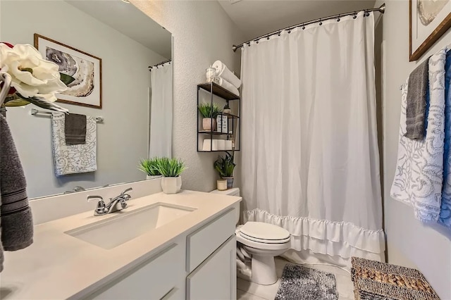 242 Freeman Loop, Liberty Hill, TX 78642 - full bathroom with vanity, tile patterned floors, curtained shower, and a textured wall