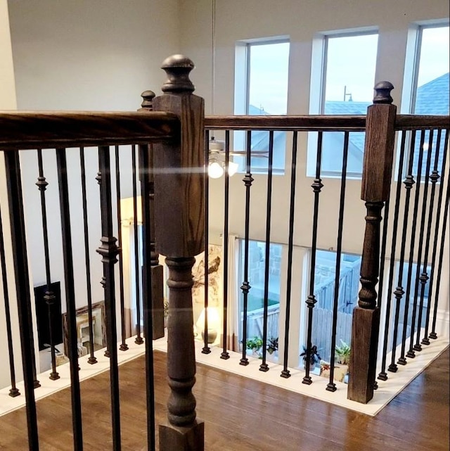 242 Freeman Loop, Liberty Hill, TX 78642 - stairs featuring wood finished floors