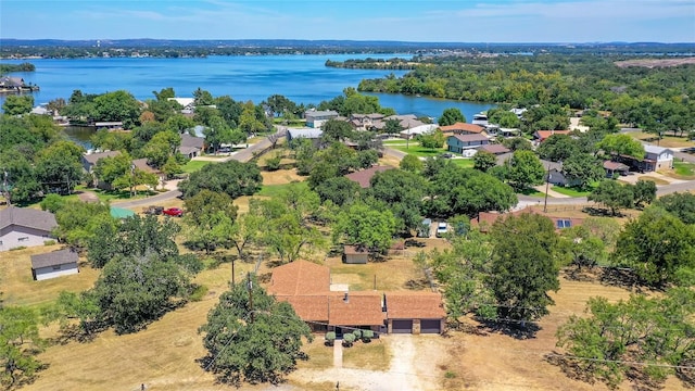 bird's eye view with a residential view and a water view