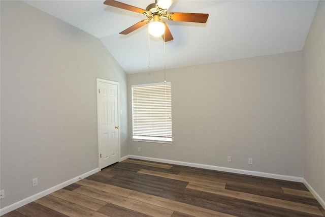 unfurnished room featuring lofted ceiling, hardwood / wood-style floors, and ceiling fan