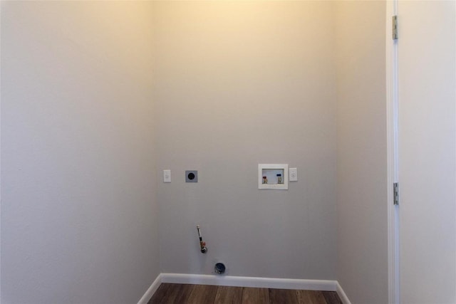 laundry room with gas dryer hookup, hookup for an electric dryer, washer hookup, and dark hardwood / wood-style flooring