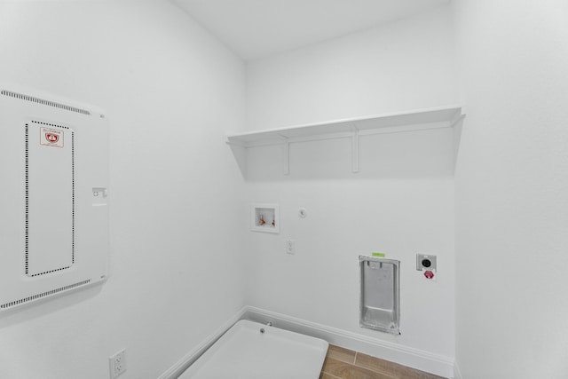 laundry room with hookup for an electric dryer, hookup for a gas dryer, hardwood / wood-style floors, and hookup for a washing machine