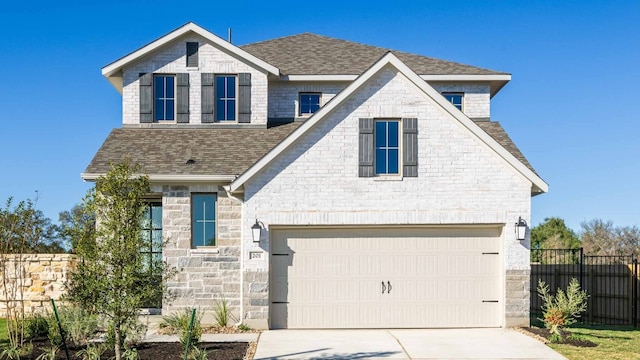 view of front of property featuring a garage