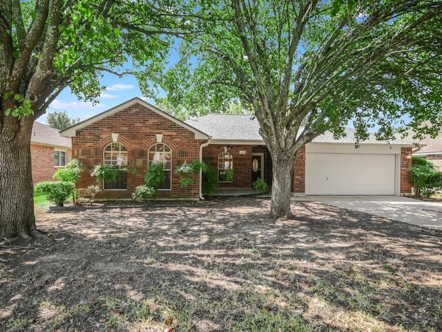 ranch-style house featuring a garage