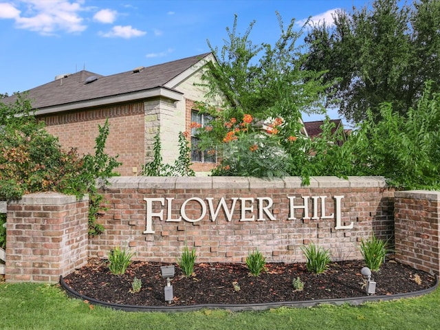 view of community sign