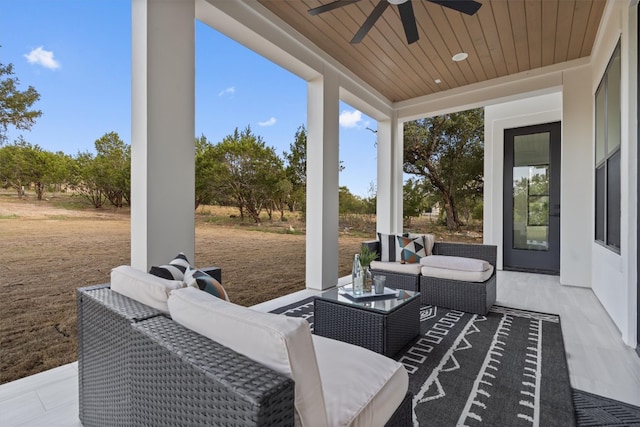 view of patio / terrace featuring ceiling fan and an outdoor living space