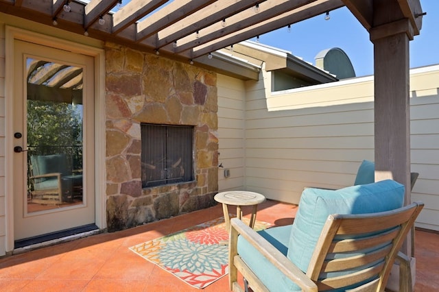 view of patio featuring a pergola