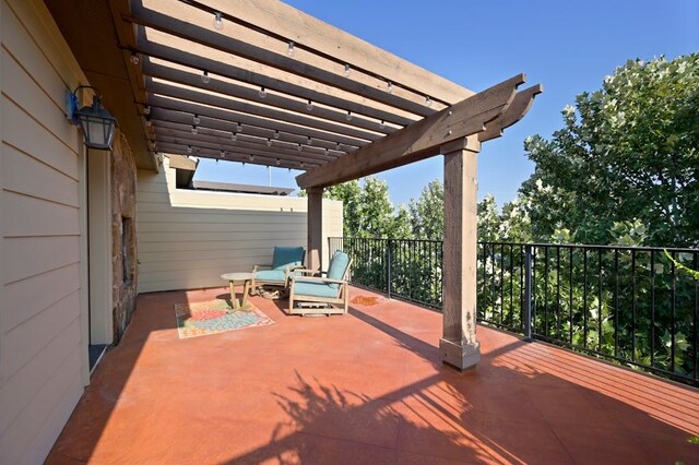 view of patio featuring a pergola