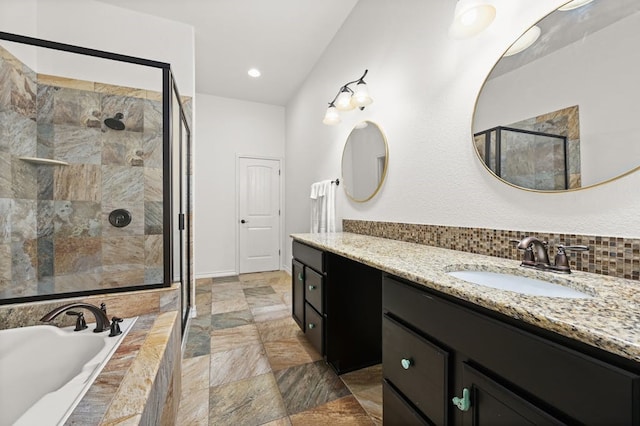 bathroom featuring backsplash, shower with separate bathtub, vanity, and tile patterned floors