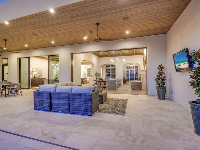 living room with recessed lighting, wood ceiling, arched walkways, and ceiling fan with notable chandelier