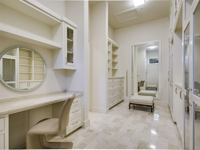 office area with attic access and baseboards