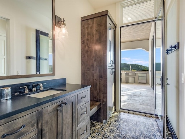 bathroom featuring vanity and tile patterned floors