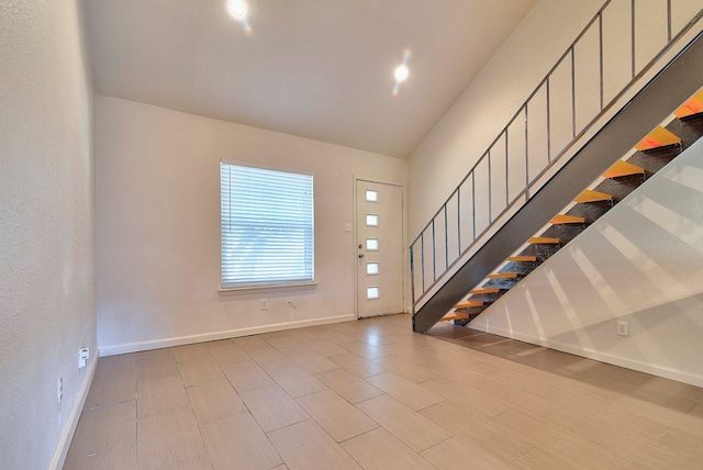 entrance foyer with light hardwood / wood-style flooring