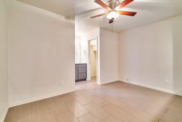 3465 Willowrun Dr, Austin, TX 78704 - unfurnished room with a ceiling fan and baseboards