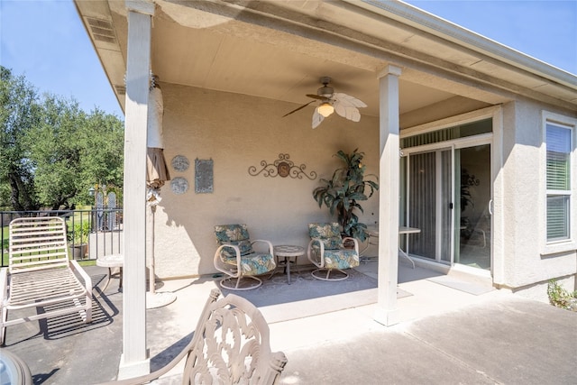 view of patio / terrace featuring ceiling fan