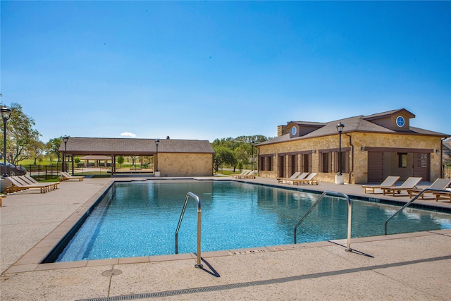 view of pool featuring a patio