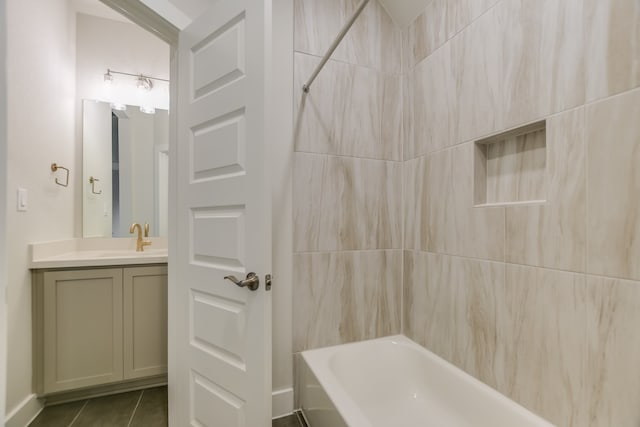 bathroom featuring shower / tub combination, tile patterned flooring, and vanity