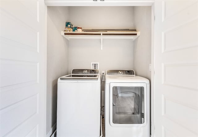 washroom with washer and clothes dryer