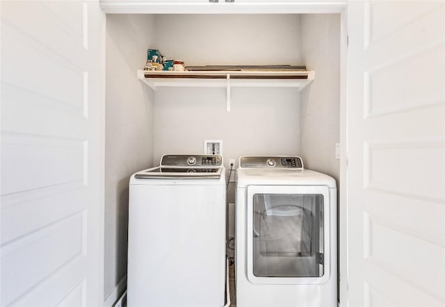 2016 Dinsdale Ln, Austin, TX 78741 - clothes washing area featuring washer and clothes dryer