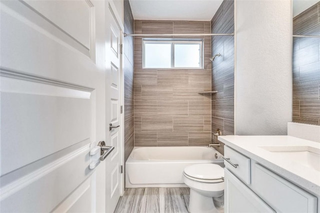 2016 Dinsdale Ln, Austin, TX 78741 - full bath featuring toilet, shower / washtub combination, and vanity