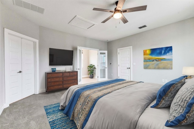 carpeted bedroom with ceiling fan