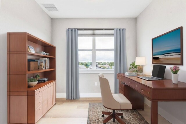 2016 Dinsdale Ln, Austin, TX 78741 - office featuring light wood finished floors and baseboards
