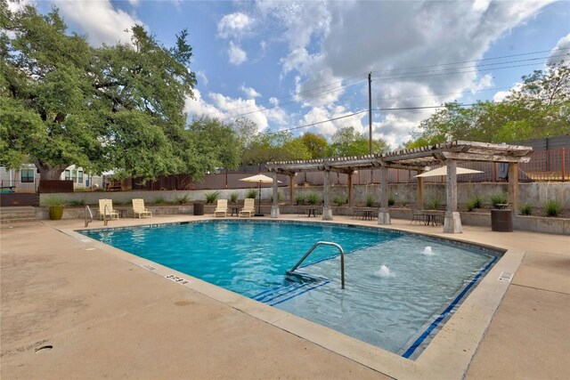 2016 Dinsdale Ln, Austin, TX 78741 - community pool with a pergola and a patio area