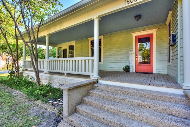 entrance to property with a porch