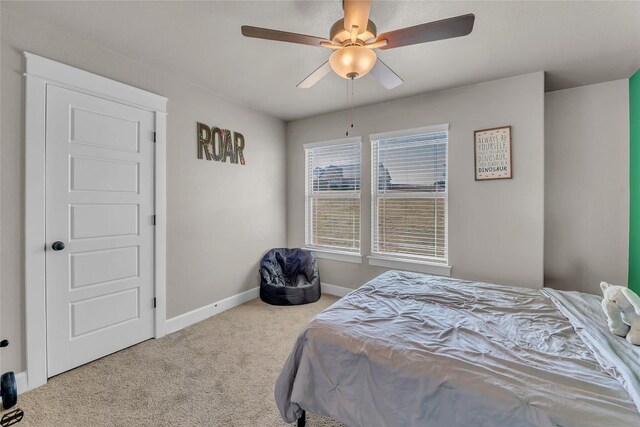 bedroom featuring carpet and ceiling fan