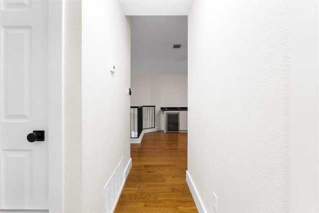 hallway featuring hardwood / wood-style floors