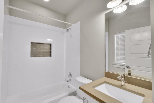 full bathroom featuring vanity, toilet, and bathing tub / shower combination