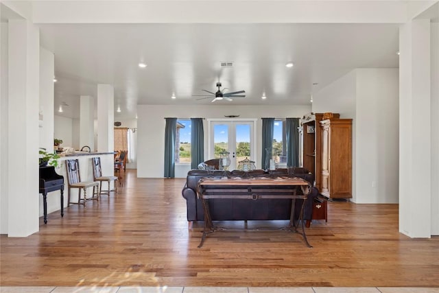 16508 Fm-973, Manor, TX 78653 - living room with wood finished floors, ceiling fan, recessed lighting, and french doors
