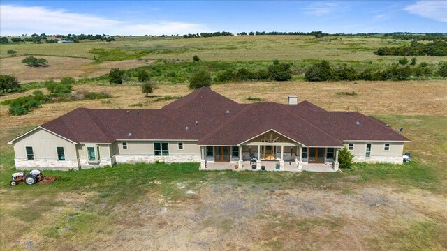 16508 Fm-973, Manor, TX 78653 - rear view of property with a patio area and a view of rural / pastoral area