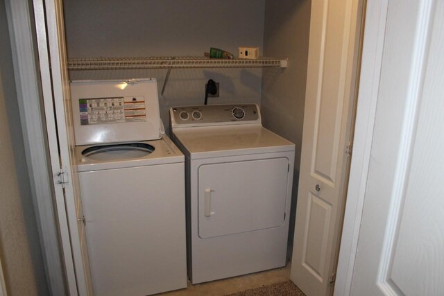 laundry room with independent washer and dryer