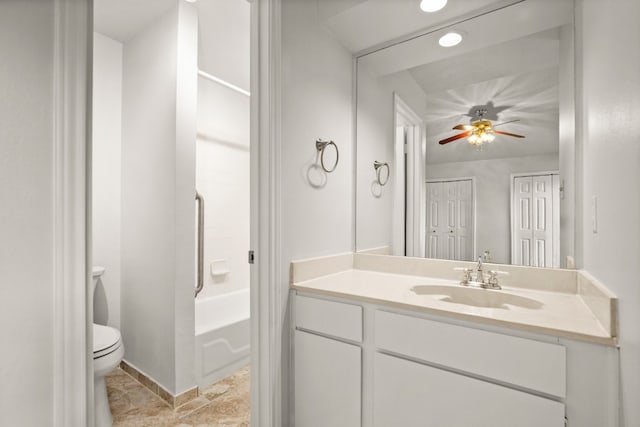 full bathroom with tile patterned floors, toilet,  shower combination, ceiling fan, and vanity