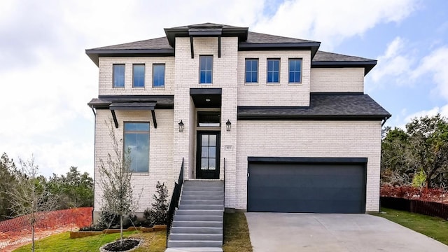 view of front of house with a garage