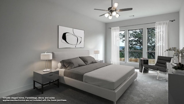 bedroom with ceiling fan, carpet floors, and multiple windows