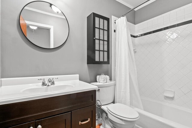 full bathroom with toilet, shower / tub combo, crown molding, and vanity