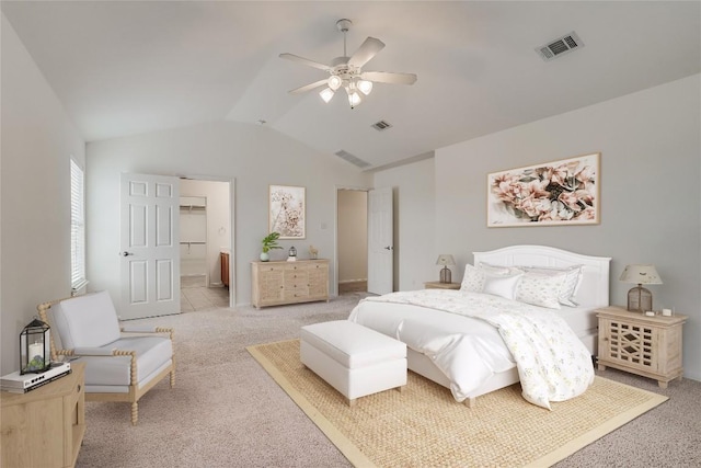 360 Wildhorse Crk, Buda, TX 78610 - bedroom with light carpet, lofted ceiling, ensuite bath, ceiling fan, and baseboards