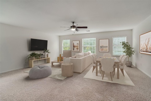 360 Wildhorse Crk, Buda, TX 78610 - living area with carpet floors, a ceiling fan, and baseboards