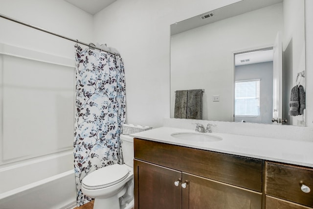 full bathroom featuring vanity, toilet, and shower / bathtub combination with curtain