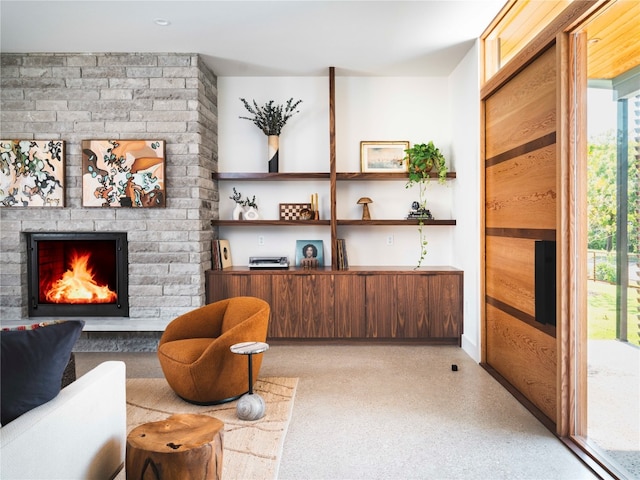 sitting room with a fireplace